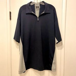 SOLD***Nike Golf Navy Blue and gray pullover windbreaker.